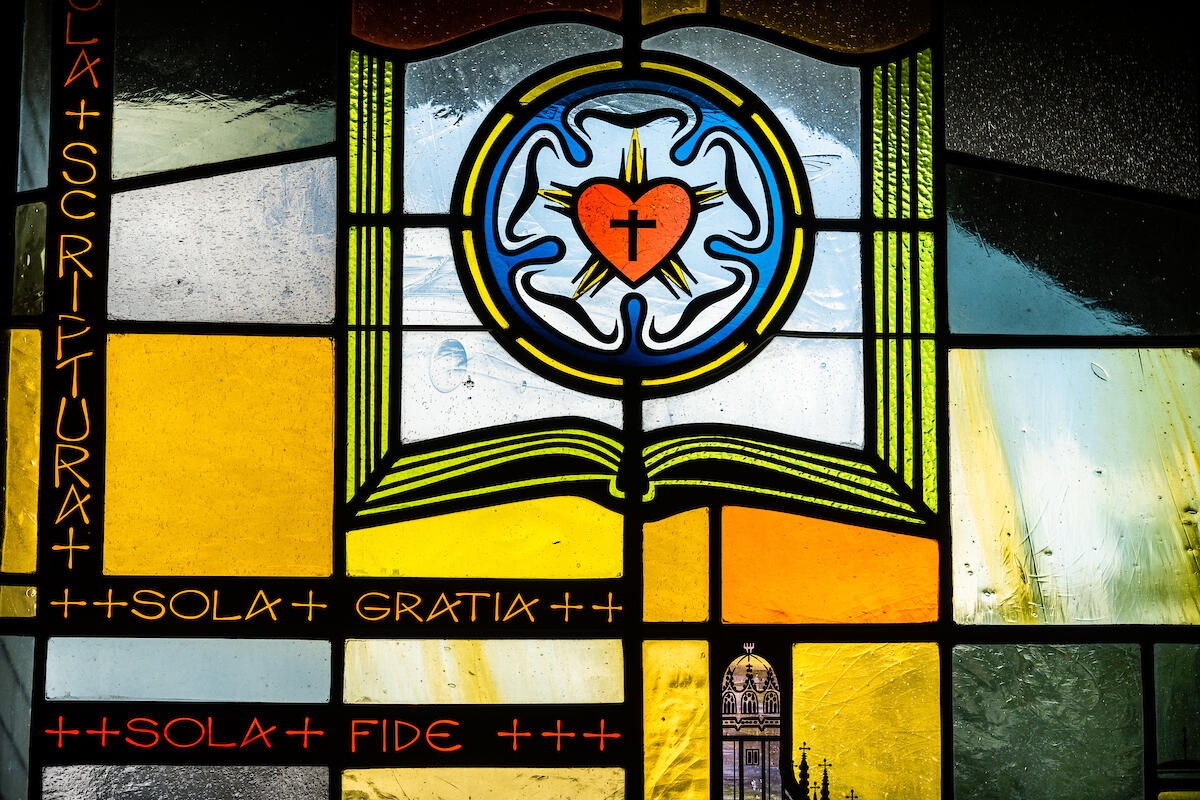Stained glass depicting the congregation’s solid stance on the Lutheran confessions summarized with “Scripture Alone, Grace Alone, and Faith Alone,” on Sunday, Aug. 2, 2020, at Elm Grove Lutheran Church, Elm Grove, Wis. LCMS Communications/Erik M. Lunsford